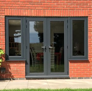 Moderne thermisch onderbroken aluminium openslaande deur met zijramen